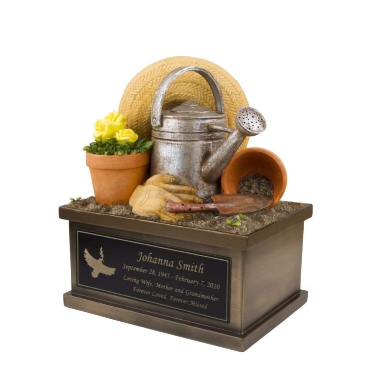 Memorial with gardening tools, hat, and nameplate for Johanna Smith