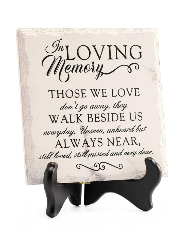 In Loving Memory" plaque with a memorial quote, displayed on a black stand
