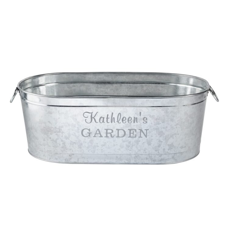Galvanized metal oval planter with "Kathleen's GARDEN" text on the front