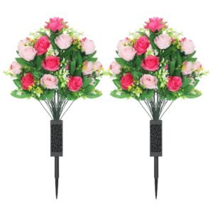 Two artificial rose bouquets with stakes for outdoor use