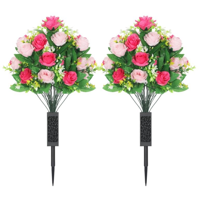Two artificial rose bouquets with pink and red flowers, on stakes