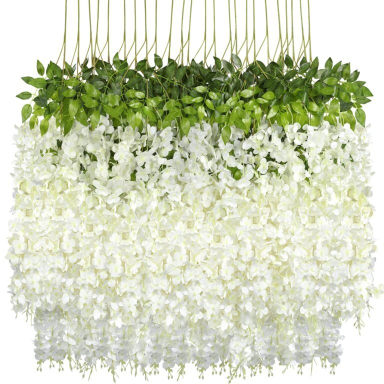 Hanging artificial white wisteria flowers with green leaves on top