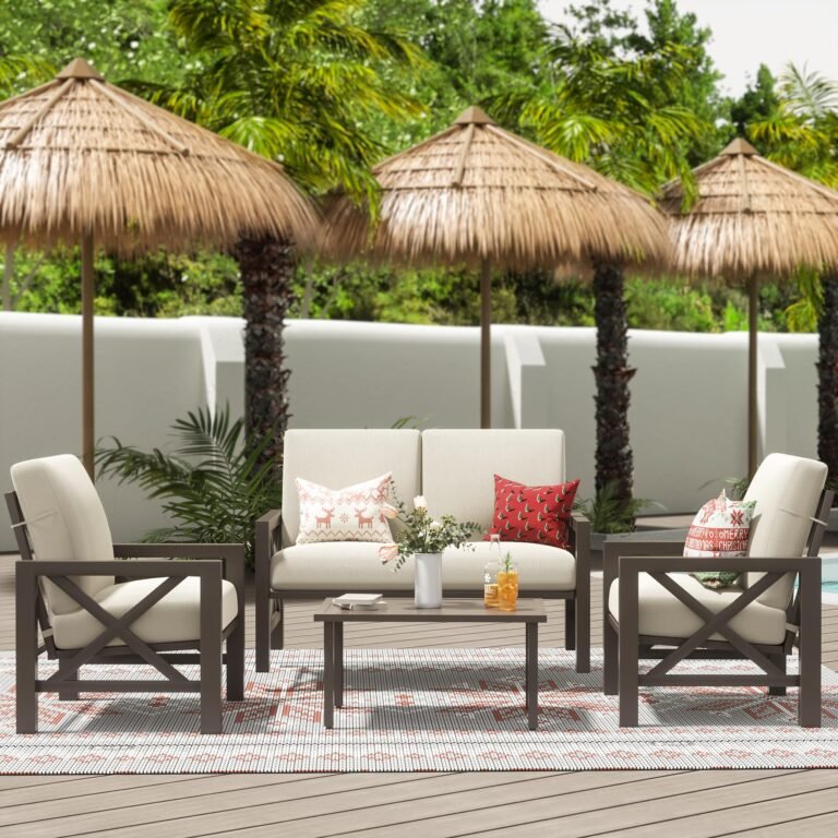 Outdoor patio furniture set with thatched umbrellas and palm trees